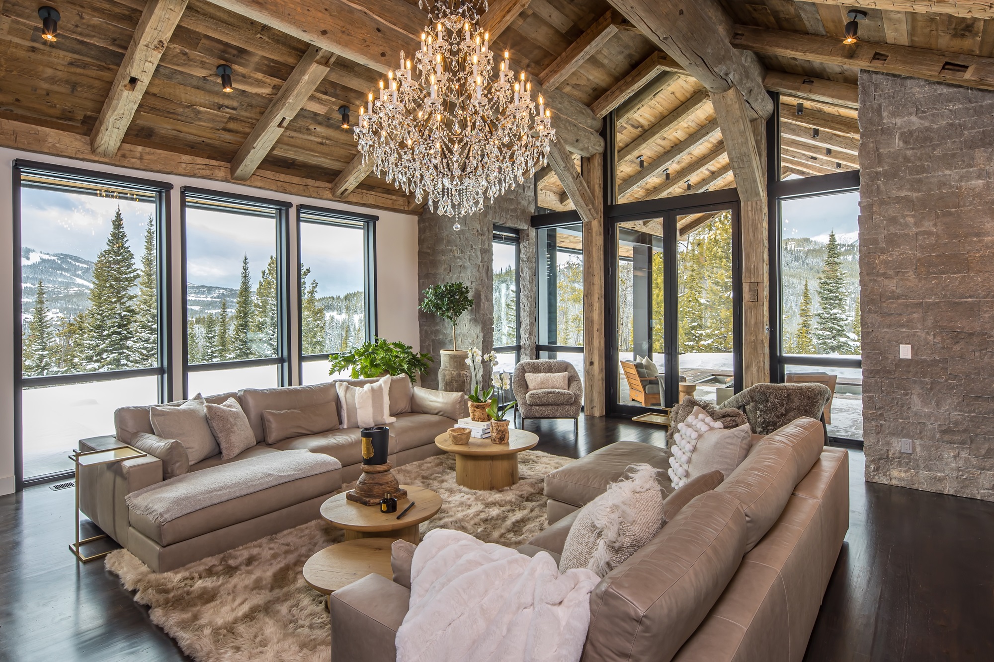 Snowy mountain view from luxury lodge living room Snowy mountain view from luxury lodge living room