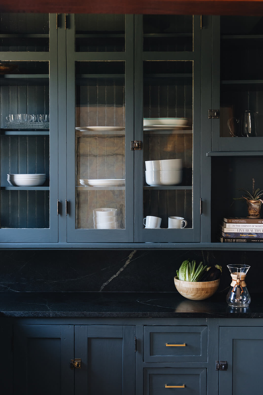 Blue inspired cupboards with glass views