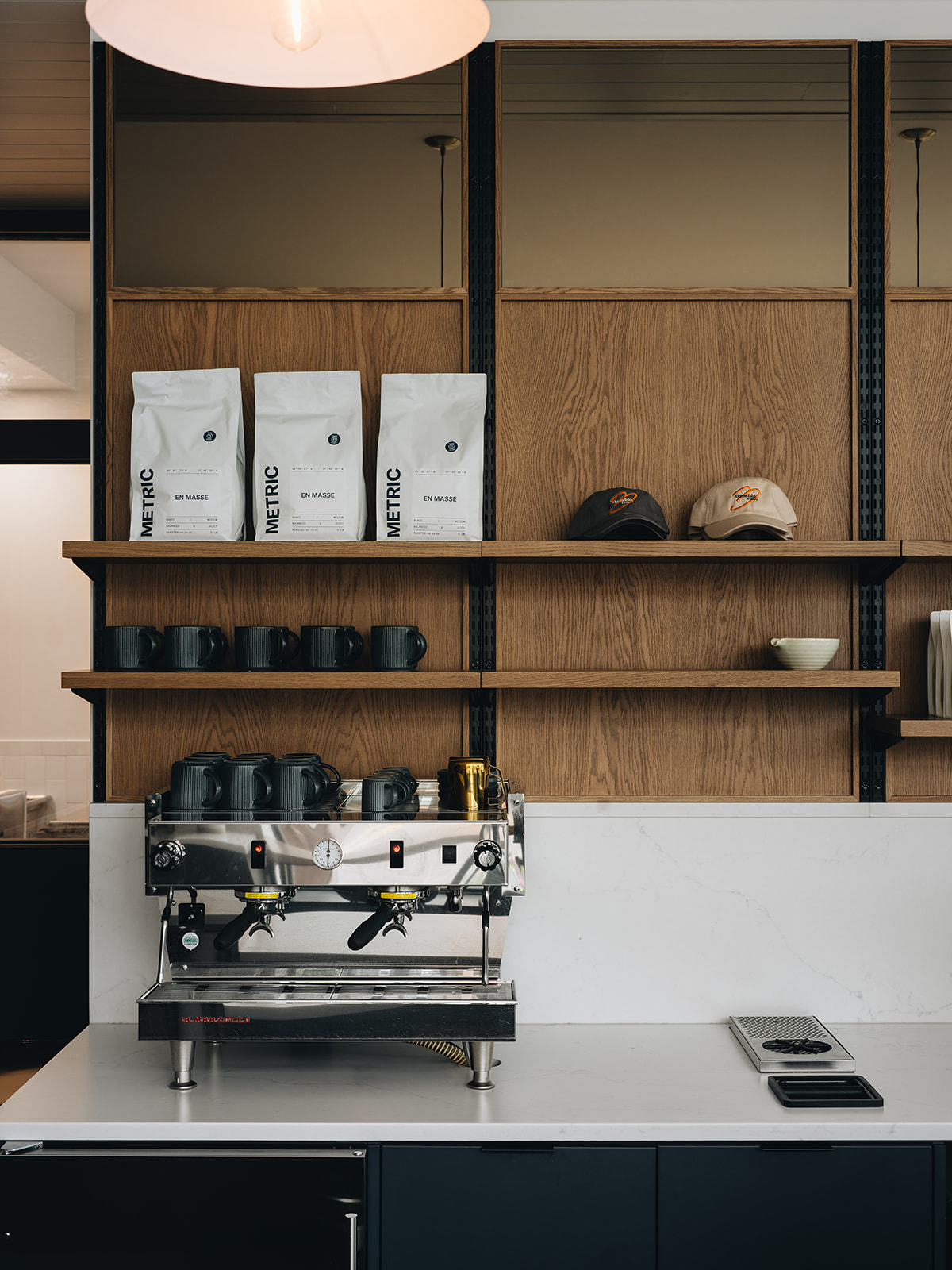 Wood shelving for storage and merchandise at a cafe in Oak Park, IL