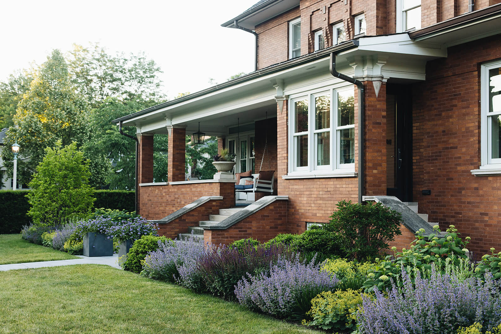 modern landscape overlooking brick house