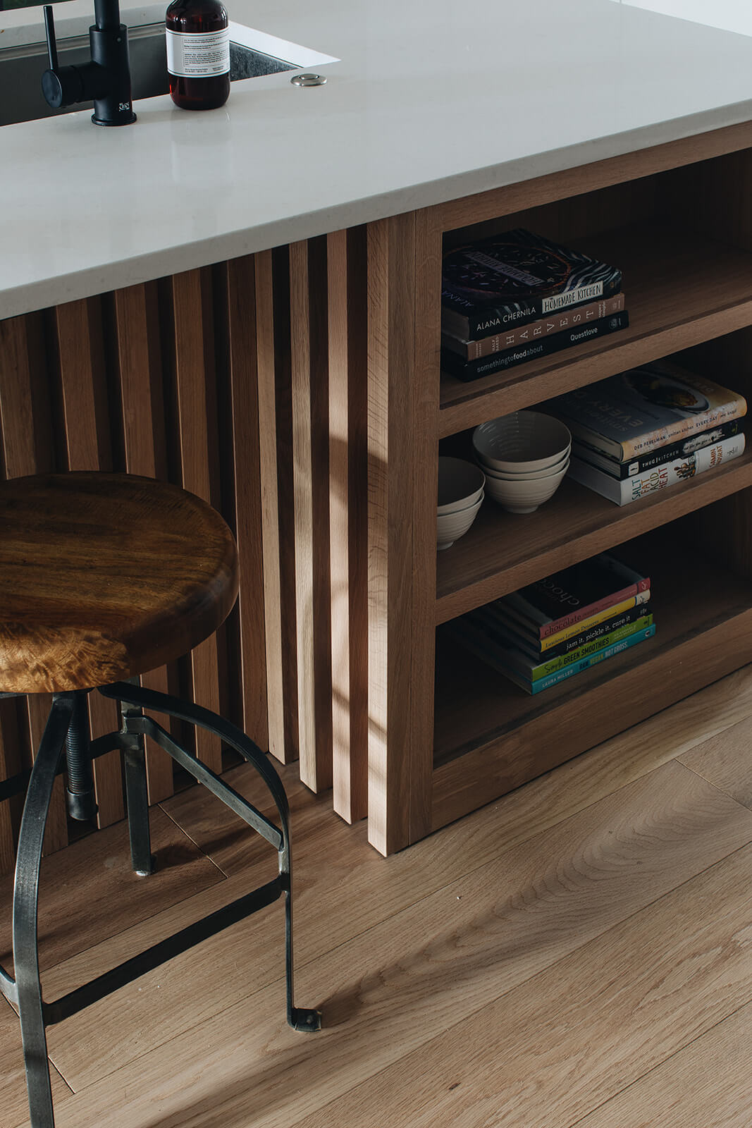 closeup of chair with wooden counter storage