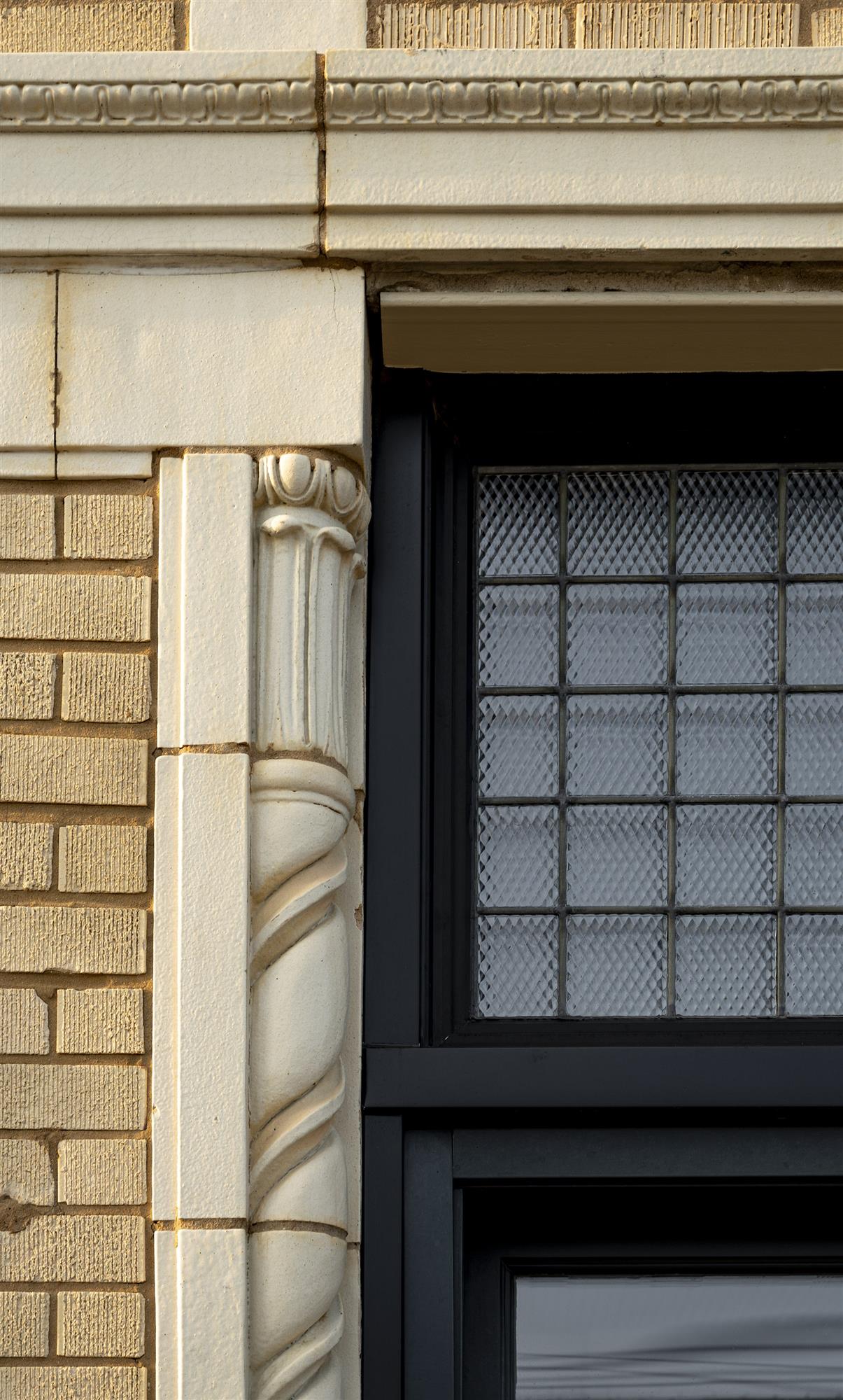Historic terracotta facade and prism glass restoration