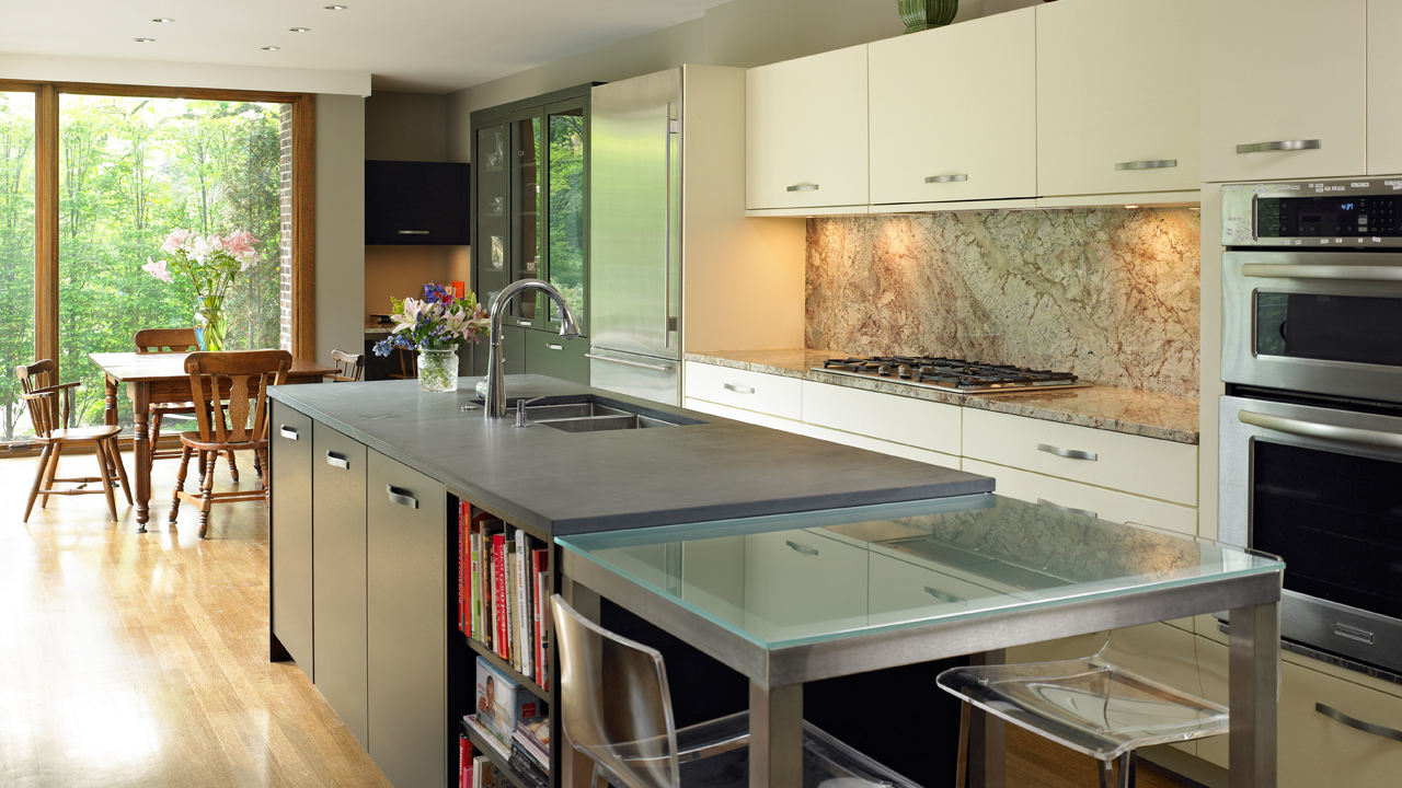We designed a beautiful 1-story steel and glass extension to this Hyde Park home Hyde Park Chicago Home Architecture