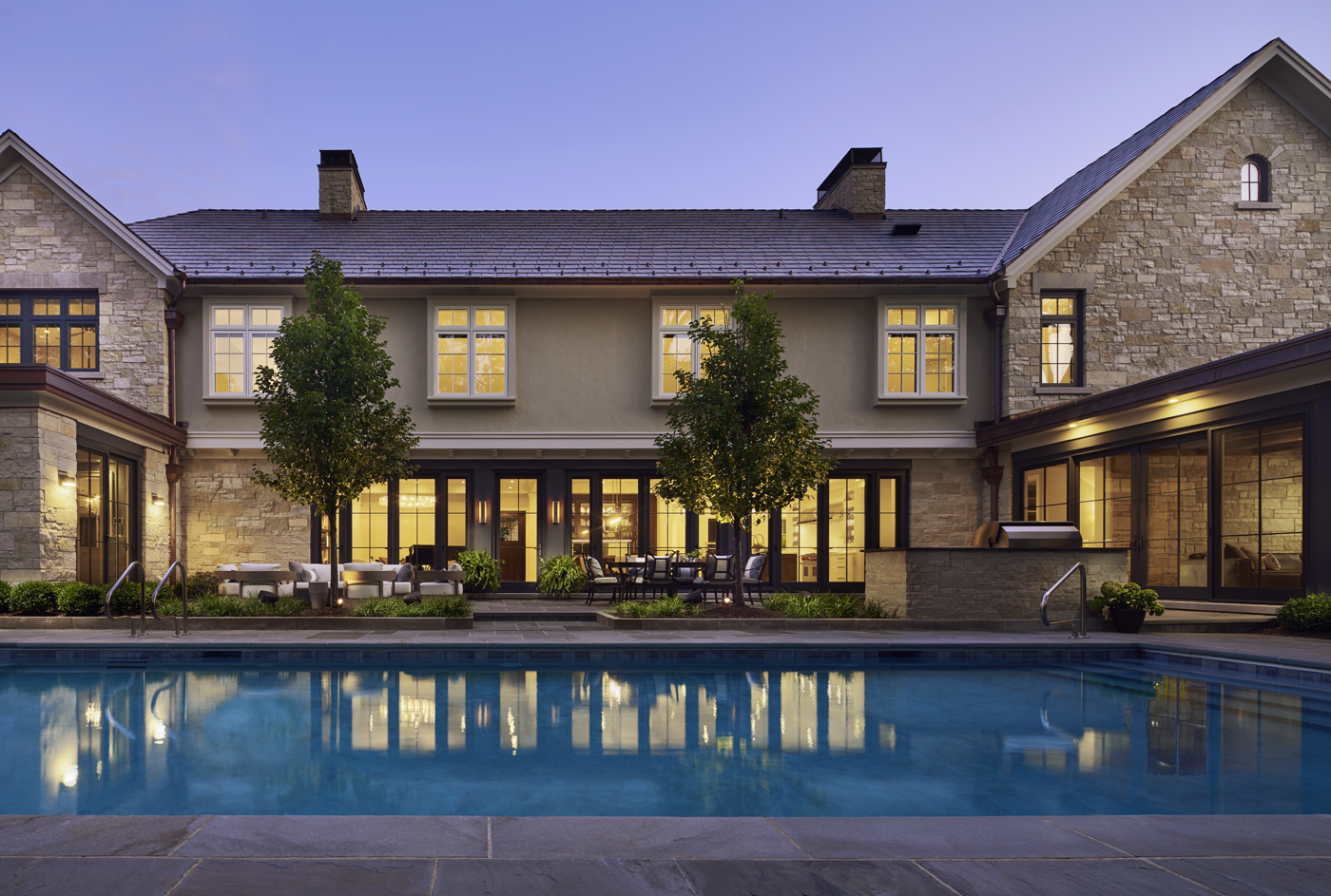 Rear view of home and pool