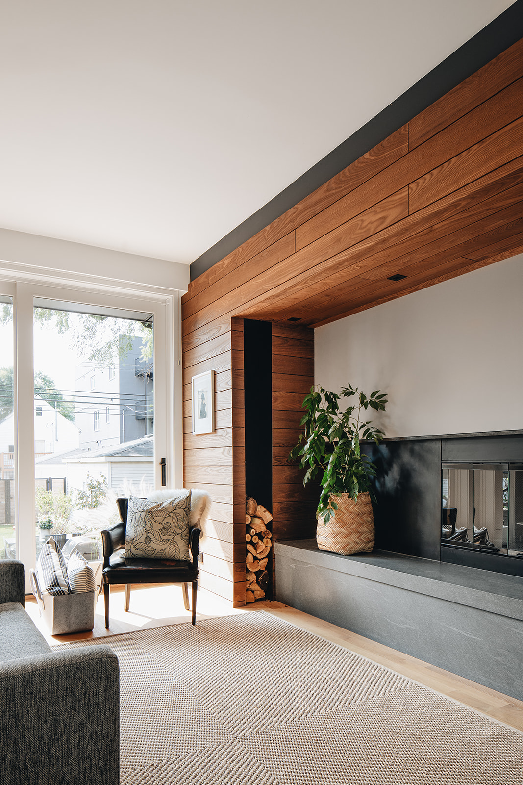 Angled view of seating in front of fireplace